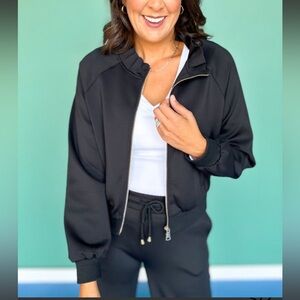 SSYS black scuba ruffle neck zip up jacket